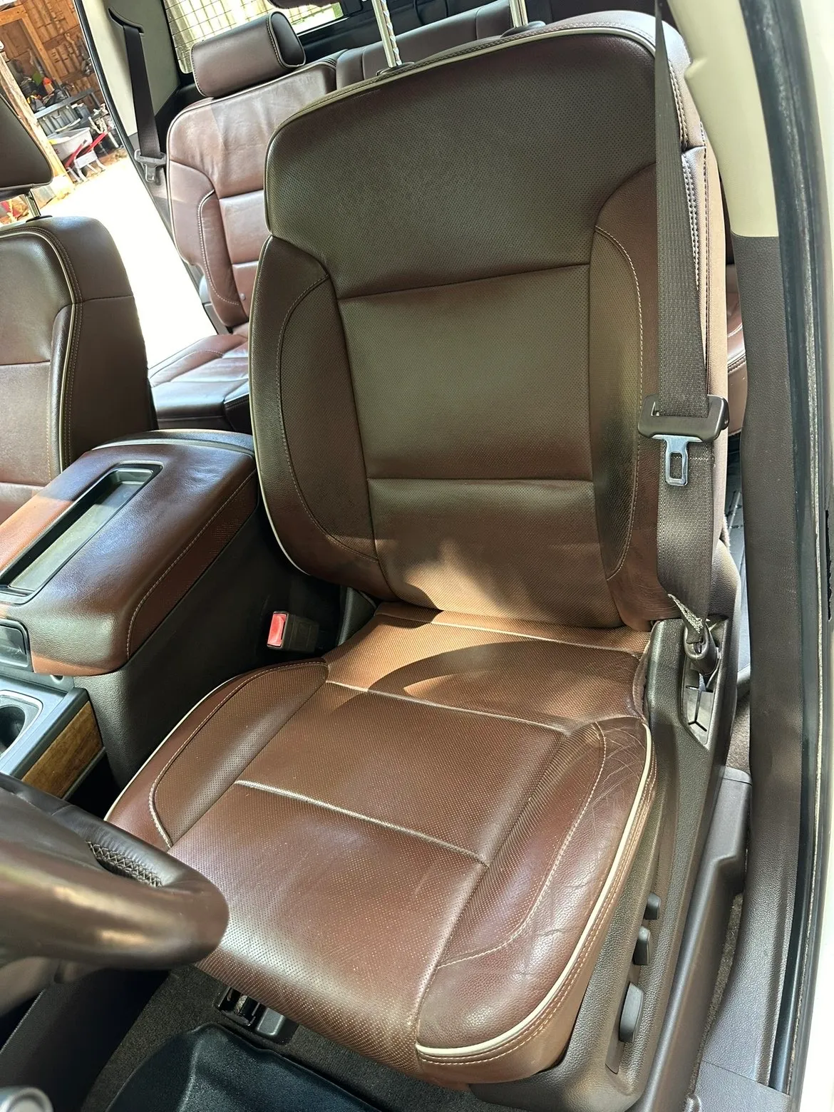 Brown leather truck seats after mold removal and conditioning